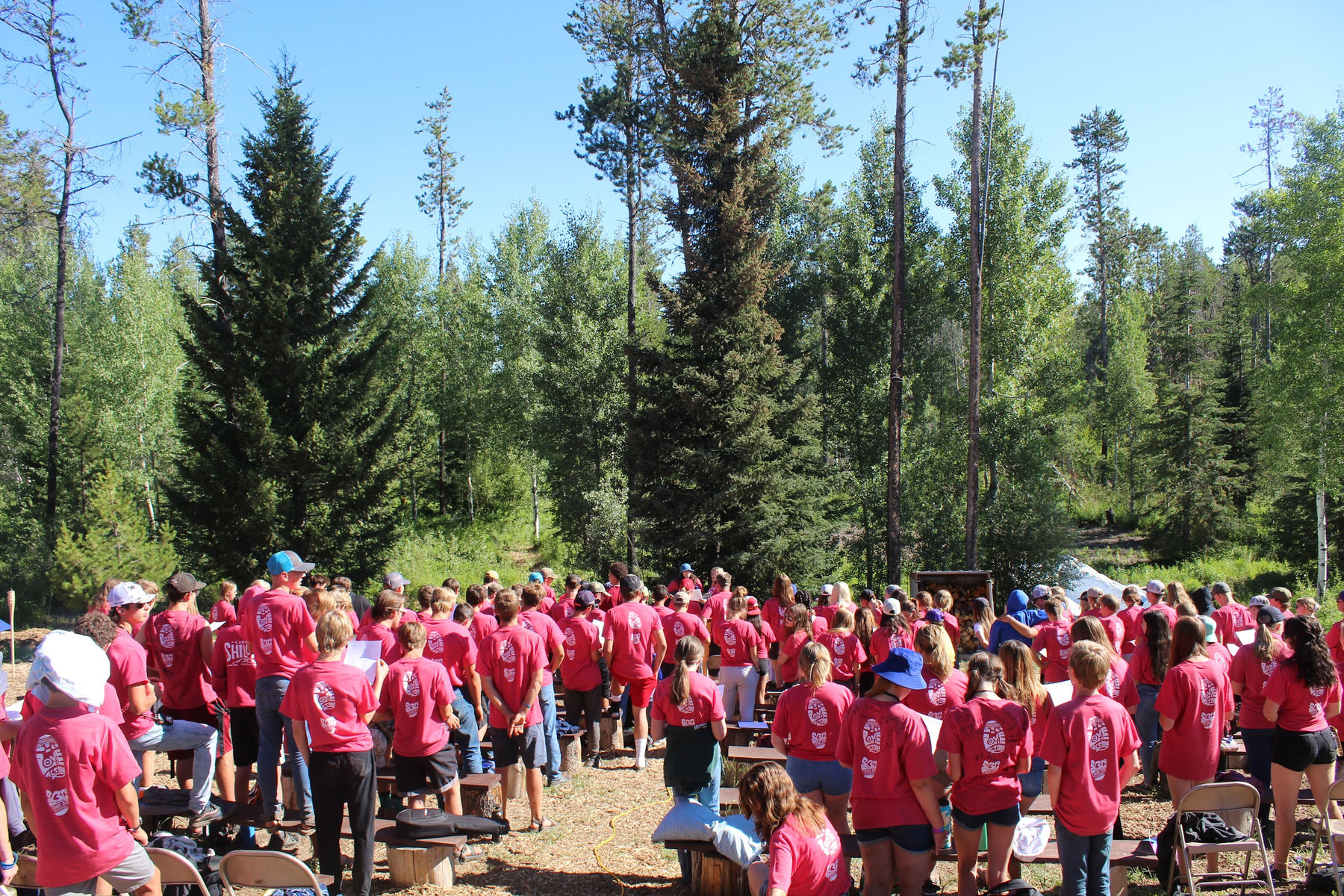 A church guest group gathering at camp